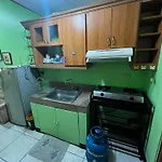 Flora\'S Place In Winland Towers Condominium