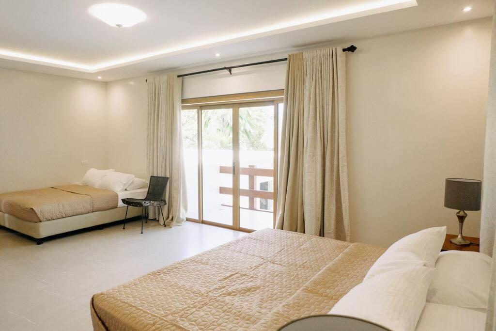 Bahay bakasyunan Reef Side Exclusive Beachfront House In Cebu *