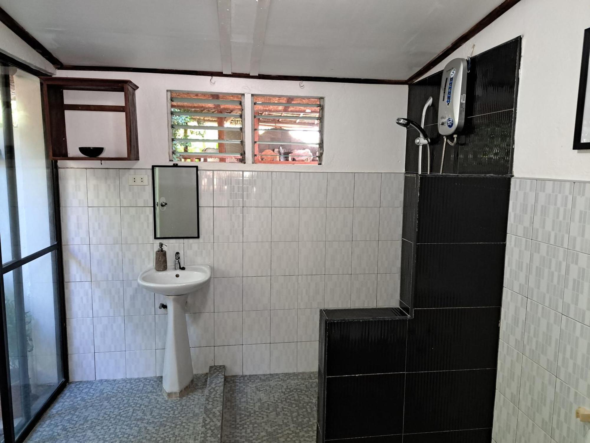 Bahay bakasyunan Palmera Palma Private 1-br #3 Moalboal