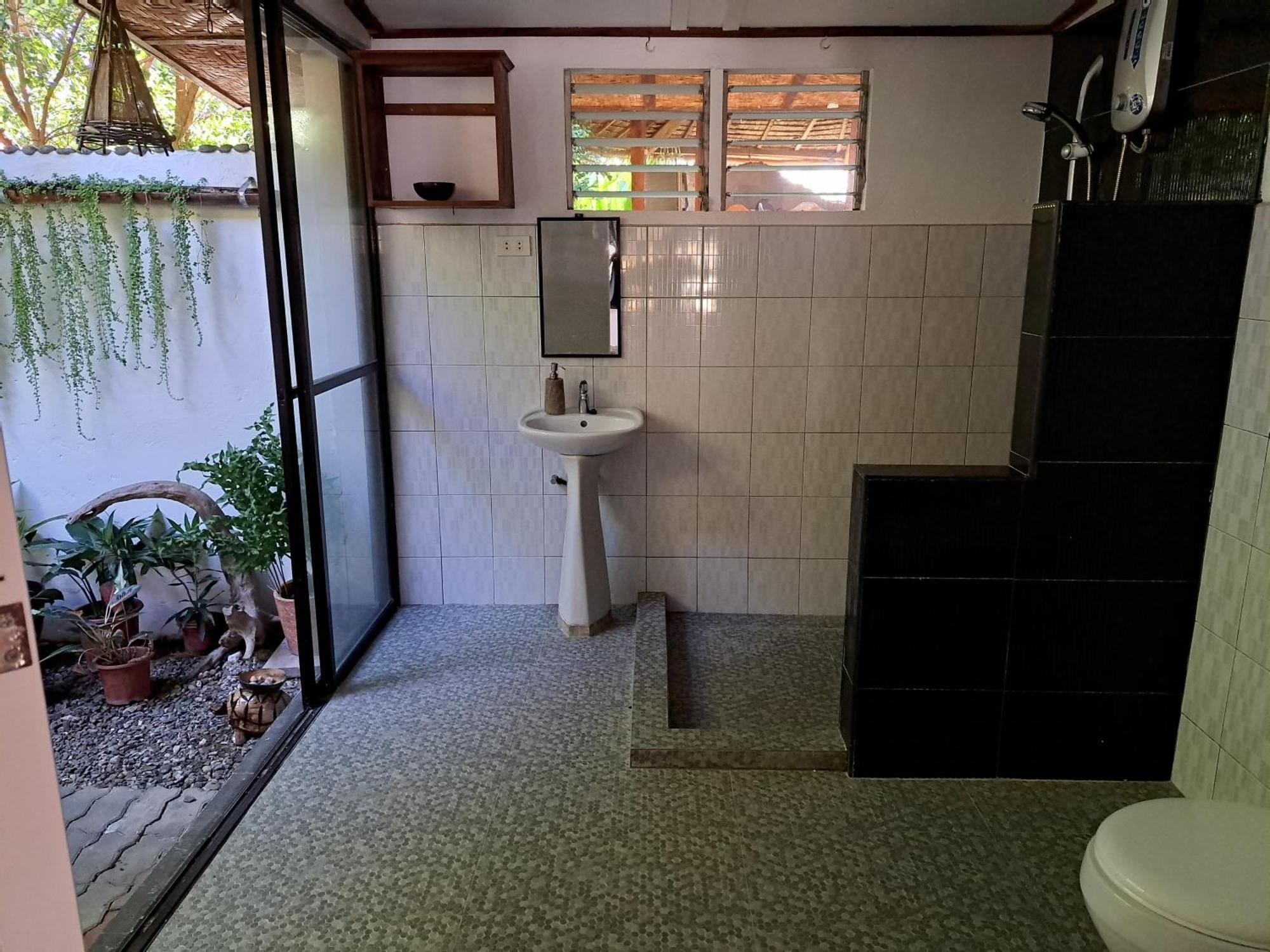 Bahay bakasyunan Palmera Palma Private 1-br #3 Moalboal