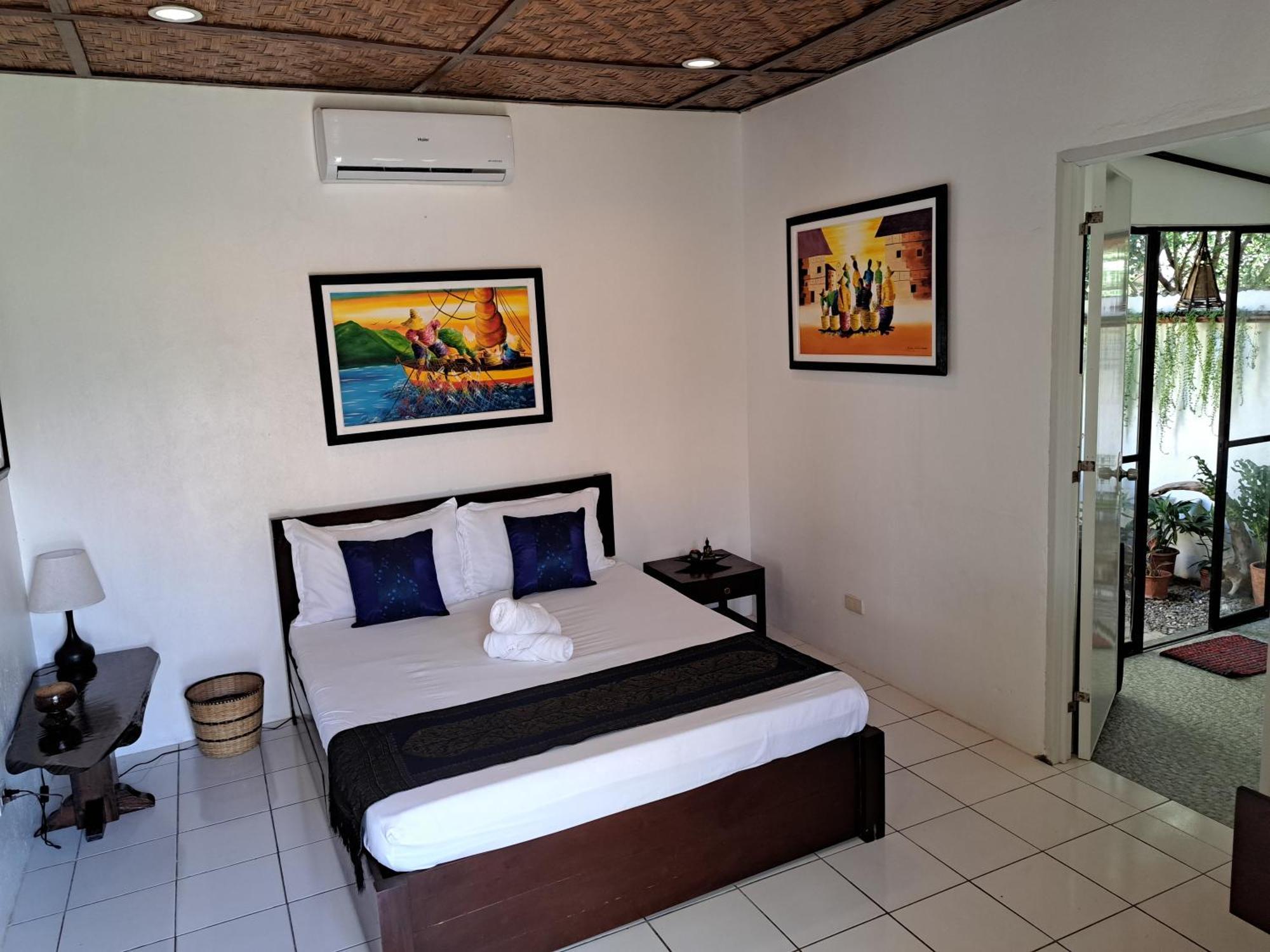 Bahay bakasyunan Palmera Palma Private 1-br #3 Moalboal