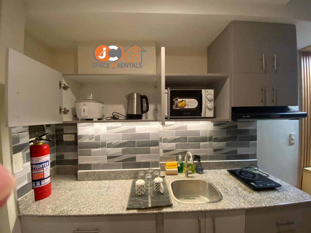 Jc Spacerentals 127b Amani Grand Residences, Balcony Pool View, Ground Floor, 5 Mins Frm Airport, Free Wifi, Netflix Apartamento