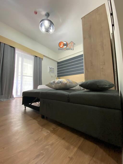 Jc Spacerentals 127b Amani Grand Residences, Balcony Pool View, Ground Floor, 5 Mins Frm Airport, Free Wifi, Netflix Apartamento Lapu-Lapu City