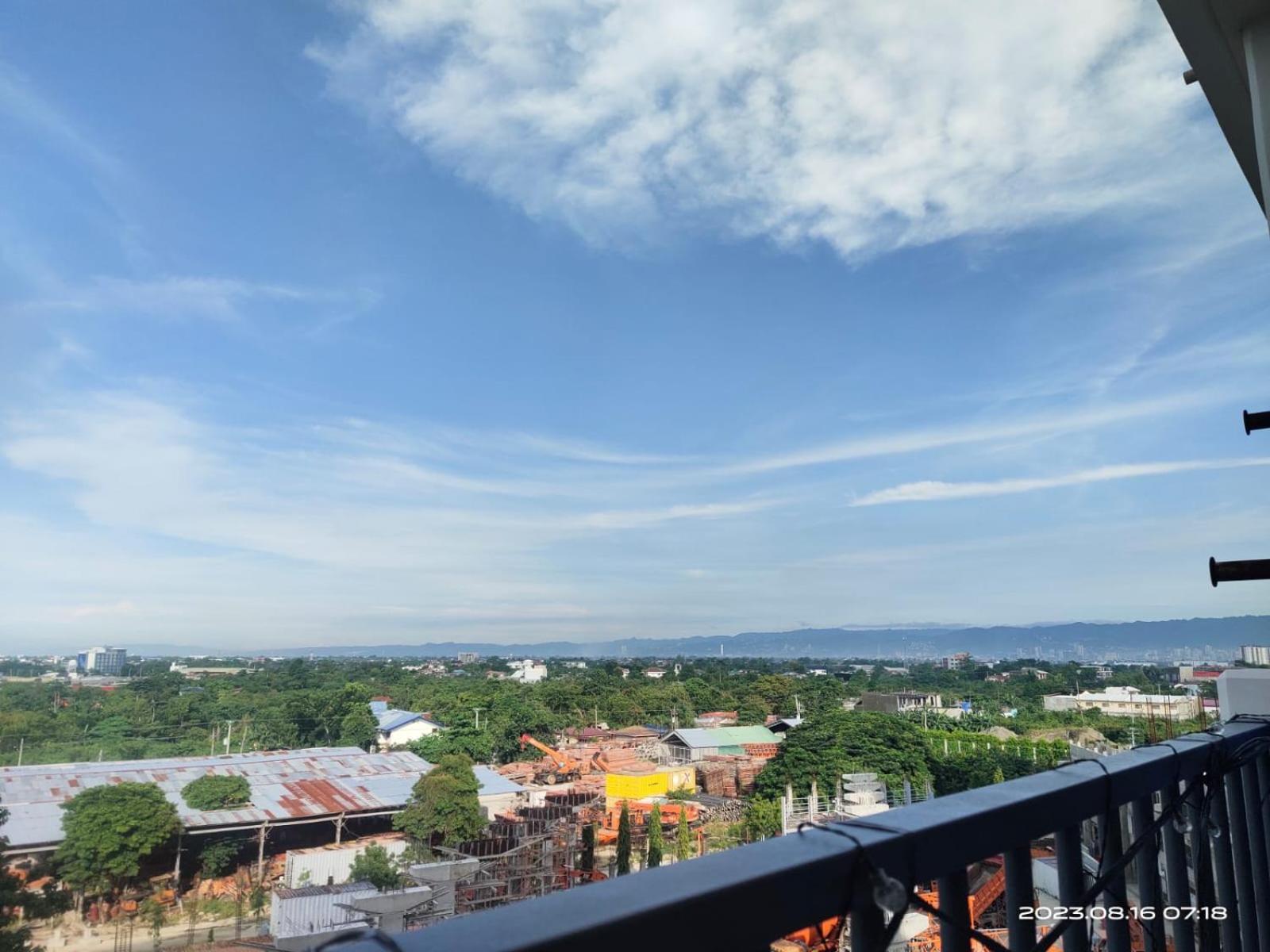 Nate & Athalia's Cityscape Condotel *