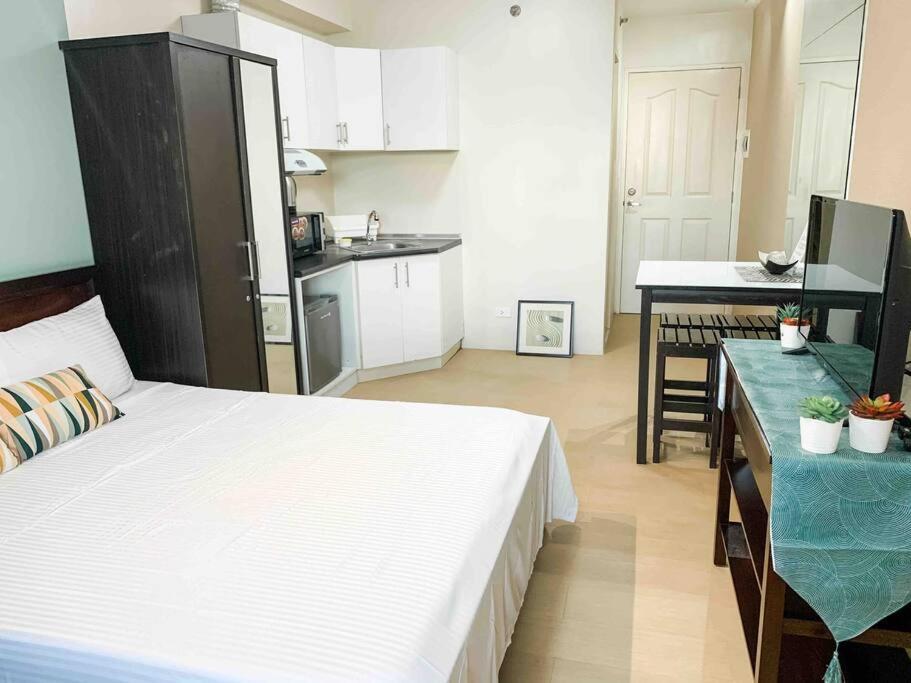 Homey At Avida It Park Apartment