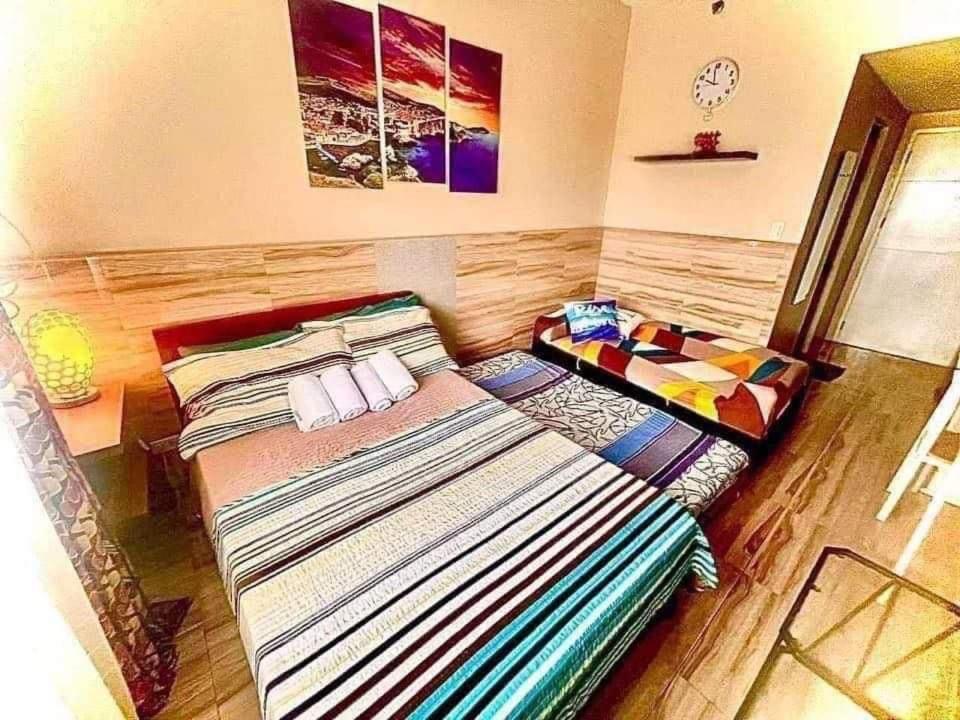Across Sm Sunvida Tower Unit Bed & Breakfast