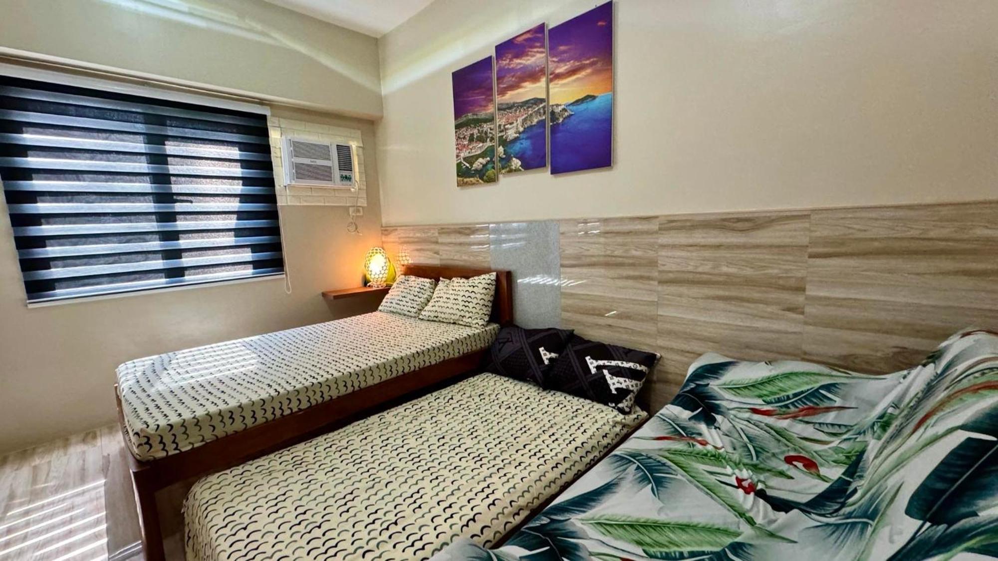 Across Sm Sunvida Tower Unit Bed & Breakfast *