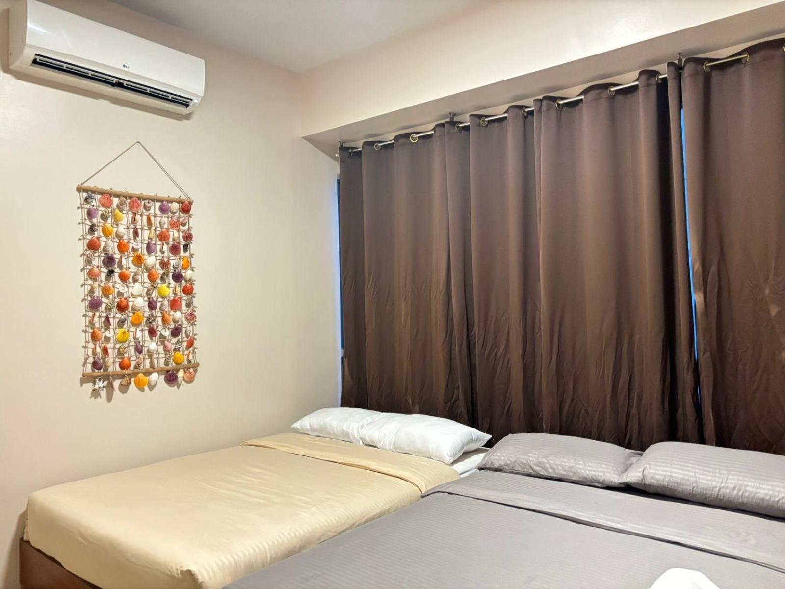 One Manchester Place, Mactan Newtown