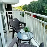 212B Amani Grand Resort Residences Near To Airport With Pool, Gym, Wifi, Netflix