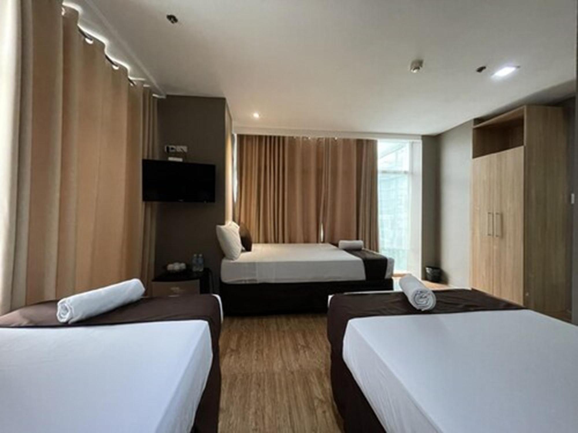 Capitol & Powered By Cocotel Hotel
