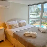 The Suite- Luxurious City Skyline