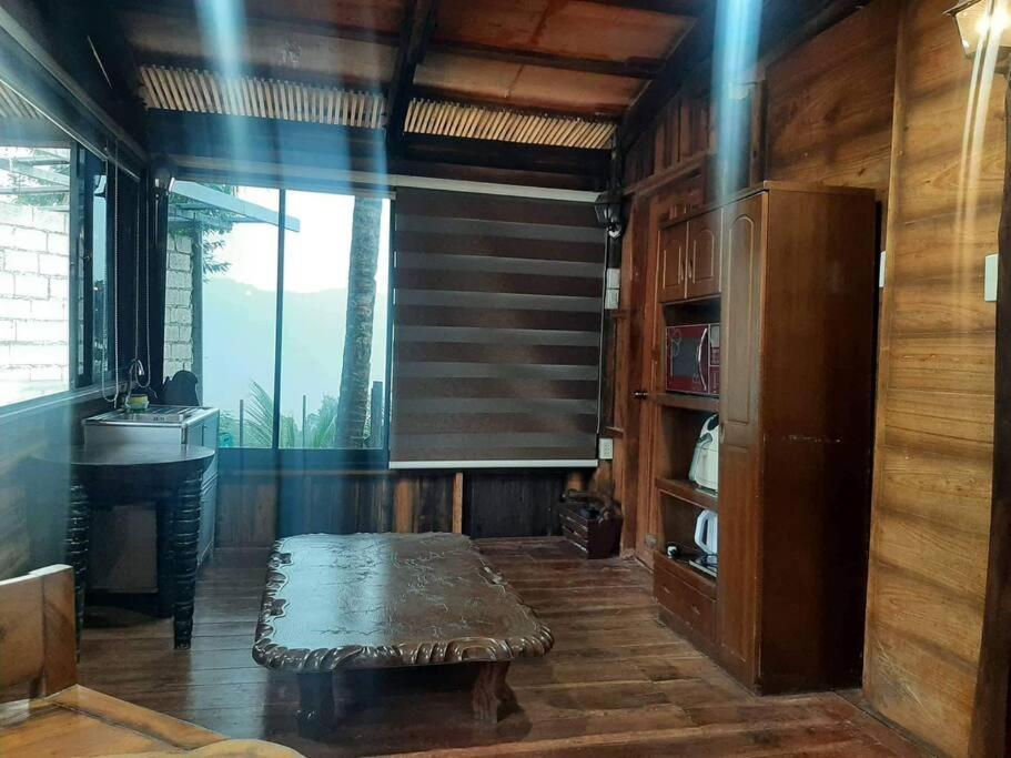 Holiday home Log Cabin With Sea & Mountain View In