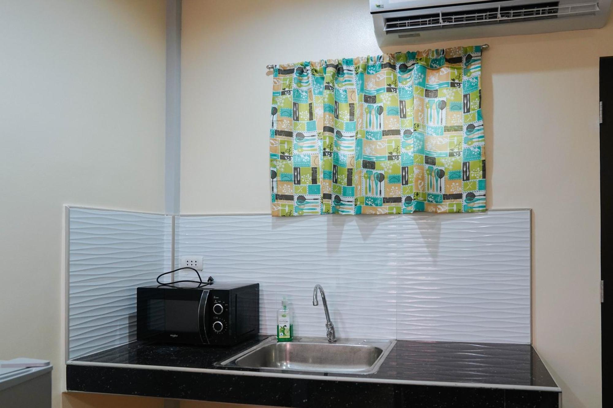 Hotel Aj Residences Apartelle Camotes Redpartner Esperanza